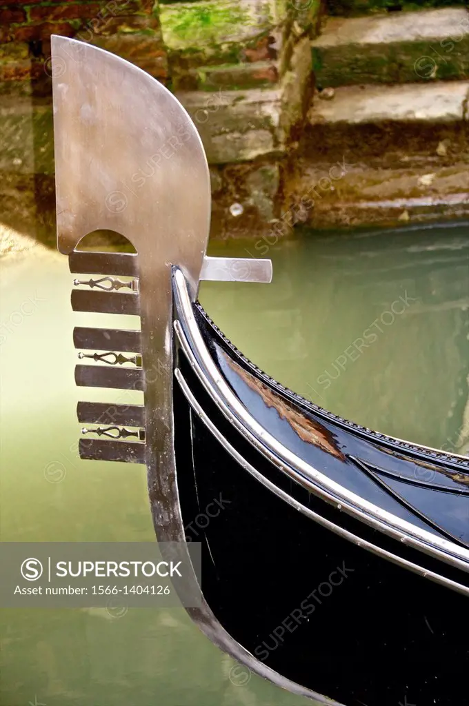 Gondola ( detail ) and canal water,Venice, Italy.