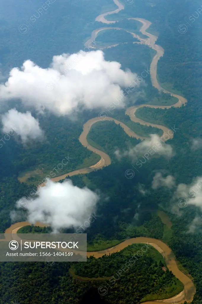 Aerial view of the thick rainforest with river that wriggles through the jungle, Papua, Indonesia, Southeast Asia