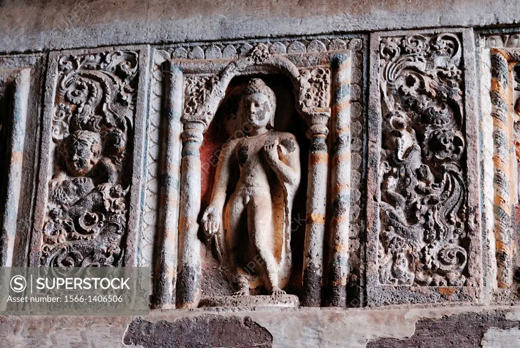 Cave 19 : Interior. Architrave showing one of the standing Buddha image in Varada mudra. Ajanta Caves, Aurangabad, Maharashtra, India.