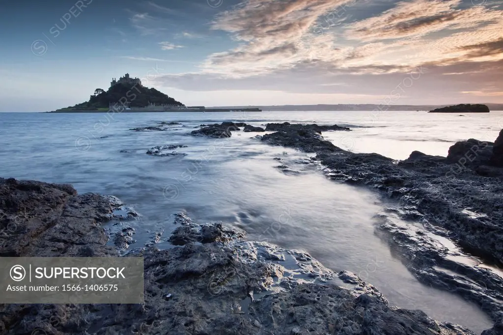 The setting sun side-lights St Michael´s Mount in Cornwall.