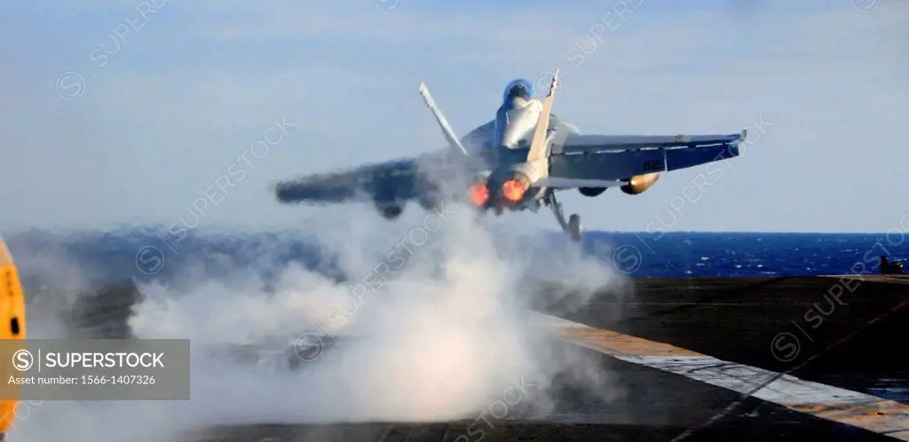 PACIFIC OCEAN (Dec. 10, 2013) An F/A-18F Super Hornet assigned to the ´Black Knights´ of Strike Fighter Squadron (VFA) 154 launches off the flight dec...