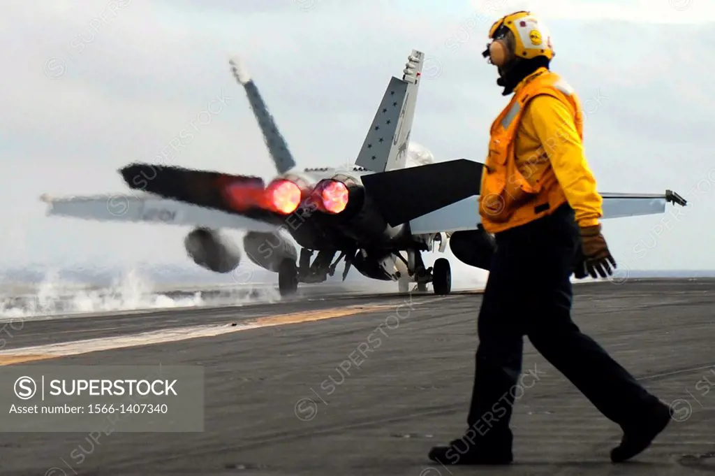 ATLANTIC OCEAN Dec. 14, 2013 An F/A-18F Super Hornet with the Black Lions of Strike Fighter Squadron VFA 213 takes off from the flight deck of the air...
