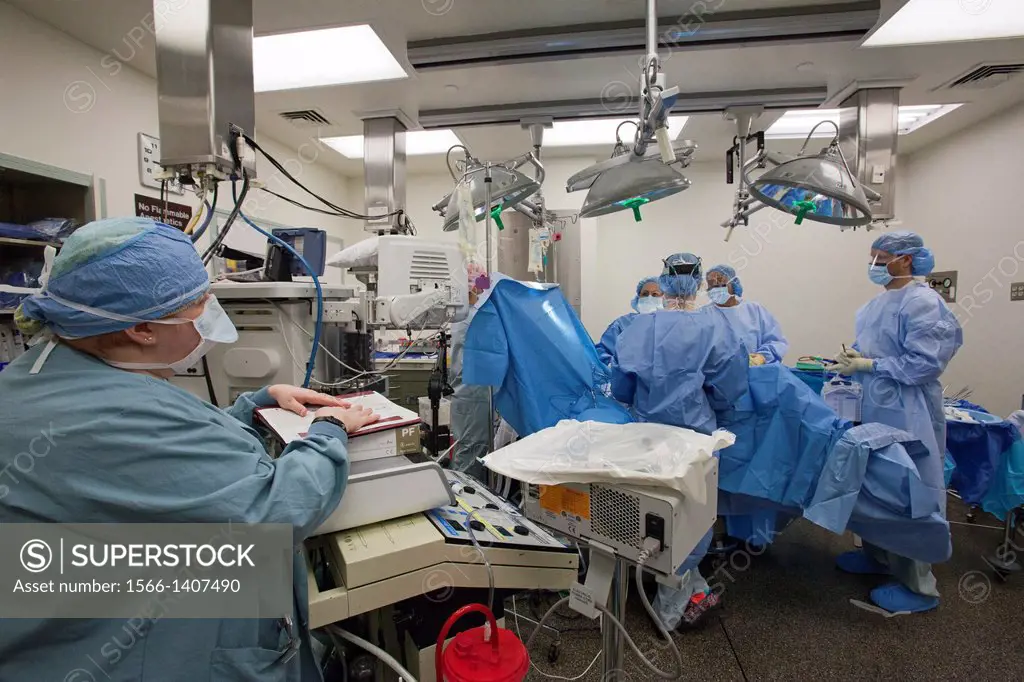"Detroit, Michigan - As surgeons prepare to perform a hysterectomy on a woman with endometrial cancer at Karmanos Cancer Institute, nurse Tammy Brown ...