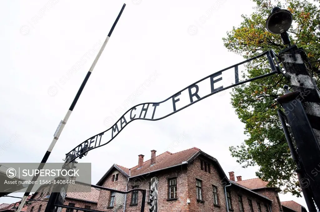 "Main Gate, """"Work will set you free"""" signage, Auschwitz concentration camp, Oswiecim, Poland, Europe."