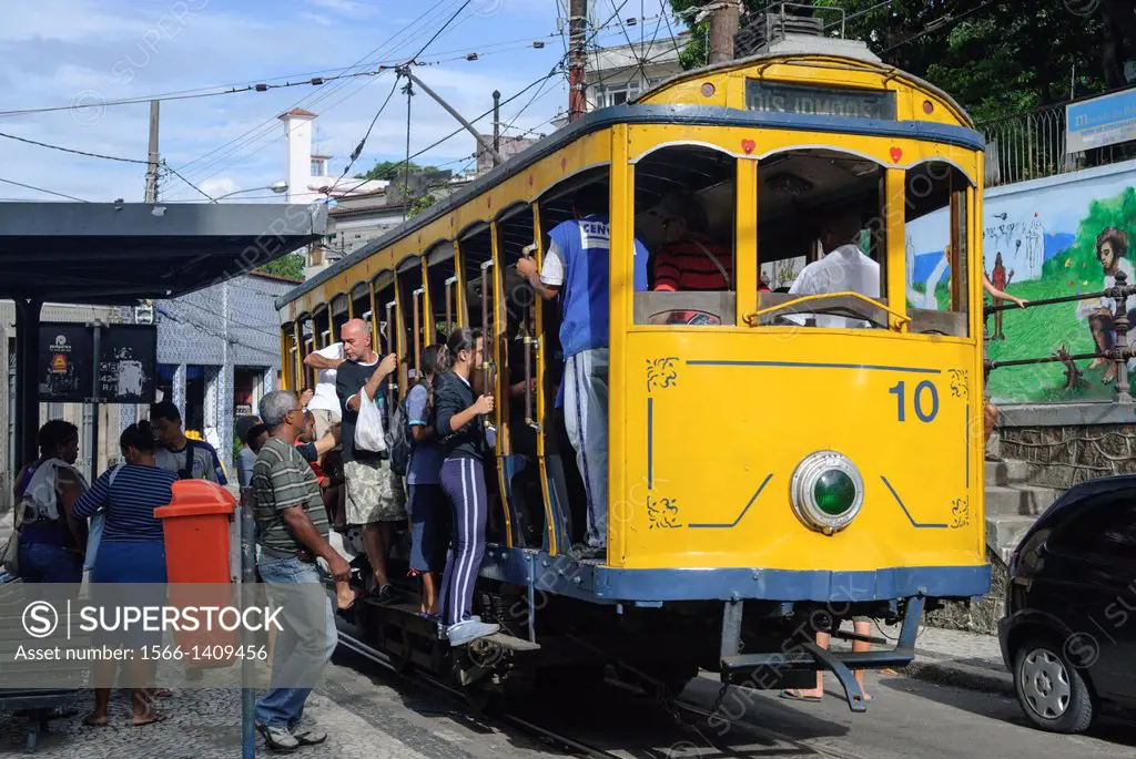 Bonde, Rio´s famous electric tram at the stop Largo do Guimaraes; Rio de Janeiro, Espirito Santo, Brazil. The historic street railway has been transpo...