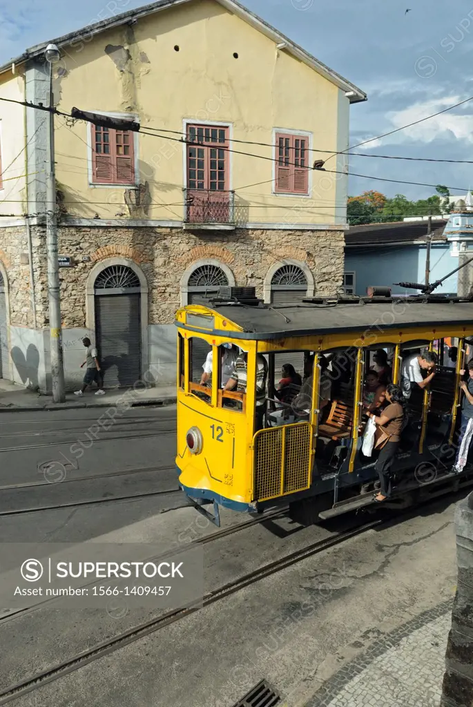 Bonde, Rio´s famous electric tram at the stop Largo do Guimaraes; Rio de Janeiro, Espirito Santo, Brazil. The historic street railway has been transpo...