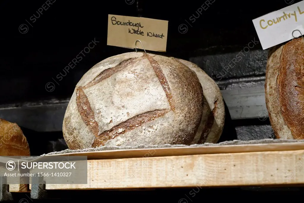 Artisan Freshly Baked Bread, Shown and Offered for Sale on a Rustic Shelf, at a New York City Artistanal Food Store.