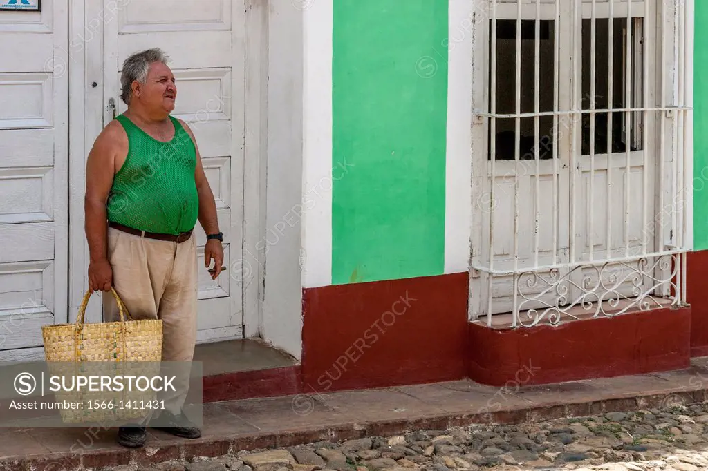 Cuban Man With Shopping Basket, Trinidad, Cuba.