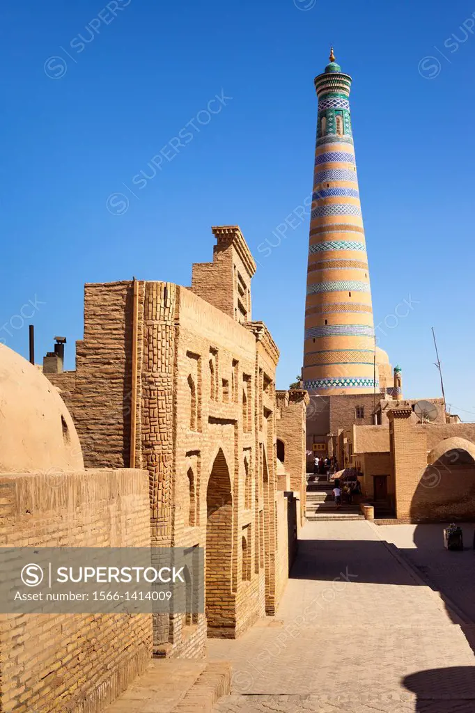 Pahlavan Mahmud Mausoleum on left and Islam Khodja Minaret, Ichan Kala, Khiva, Uzbekistan.