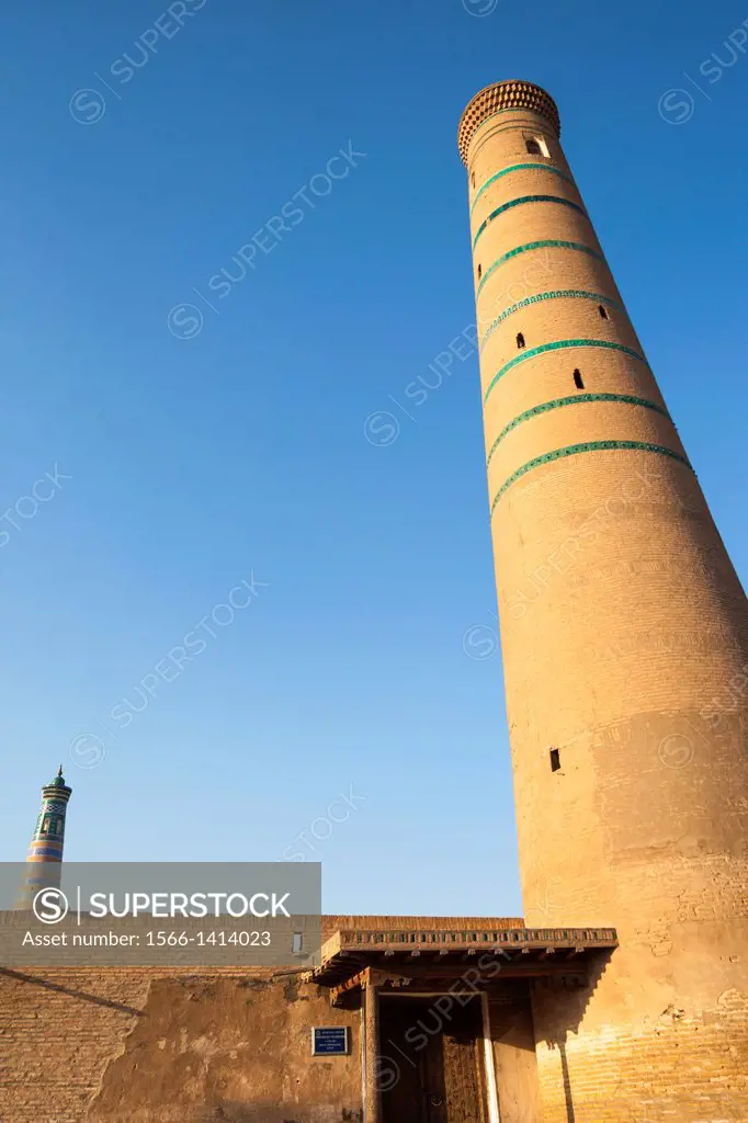 Juma Mosque, also known as Juma Masjidi Va Minorasi, and Islam Khodja Minaret behind, Ichan Kala, Khiva, Uzbekistan.
