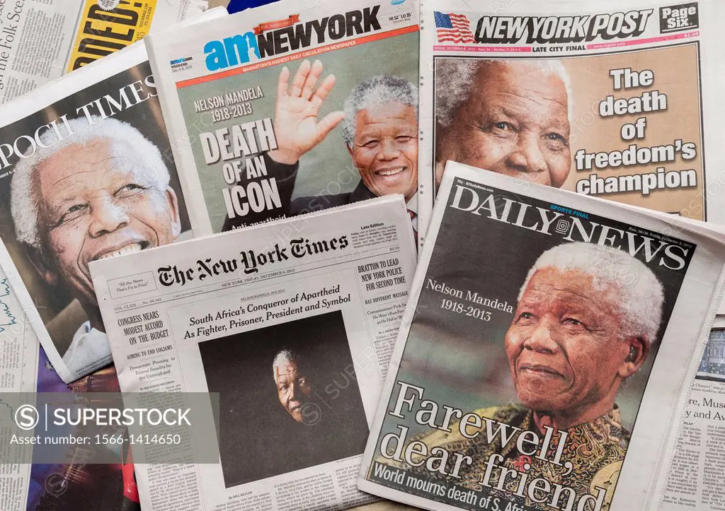 New York newspaper covers on Friday, December 6, 2013 report on the death of South African civil rights activist Nelson Mandela at the age of 95.