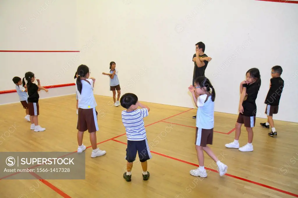 China, Hong Kong, Island, Central, Hong Kong Squash Centre, center, court, class, Asian, man, teacher, boy, girl, student, warm up, warming, exercisin...