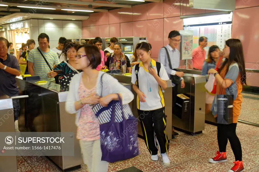 China, Hong Kong, Kowloon, Prince Edward, Prince Edward MTR Subway Station, public transportation, turnstile, gate, passengers, riders, exiting, Asian...