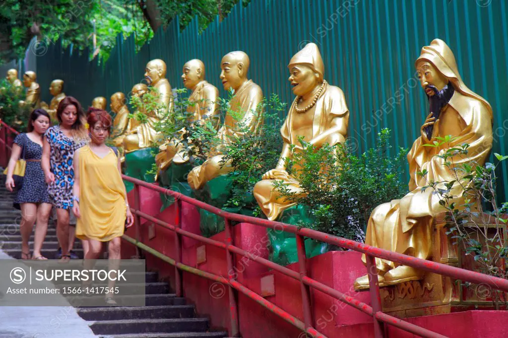 China, Hong Kong, New Territories, Sha Tin, Ten Thousand 10,000 Buddhas Monastery, golden, path, statues, Buddha, Buddhism, Asian, woman, descending,.