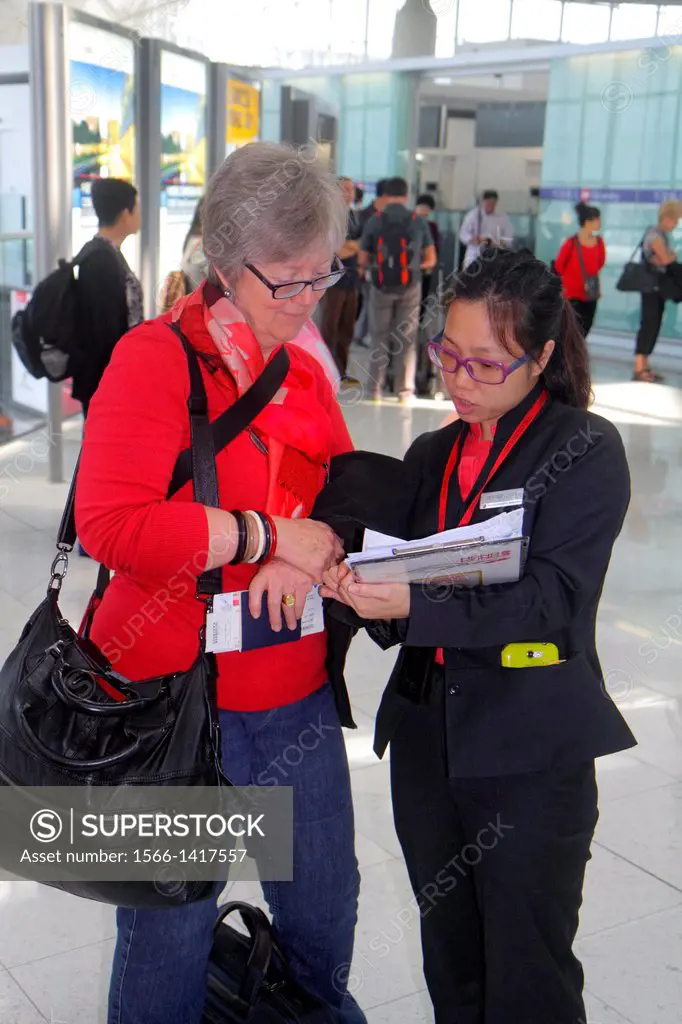 China, Hong Kong, Chek Lap Kok, Hong Kong International Airport, HKG, Asian, woman, tourism representative, taking survey, asking questions, gathering...