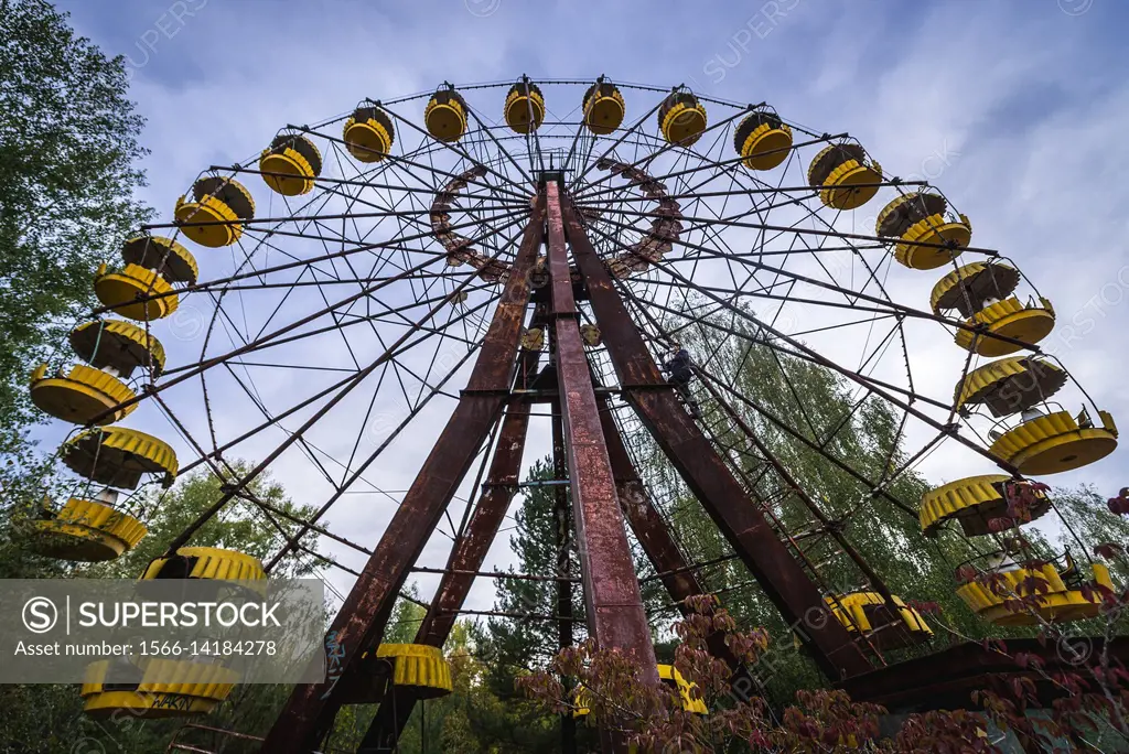 Ferris wheel in amusement park in Pripyat ghost city of Chernobyl Nuclear Power Plant Zone of Alienation around nuclear reactor disaster in Ukraine.