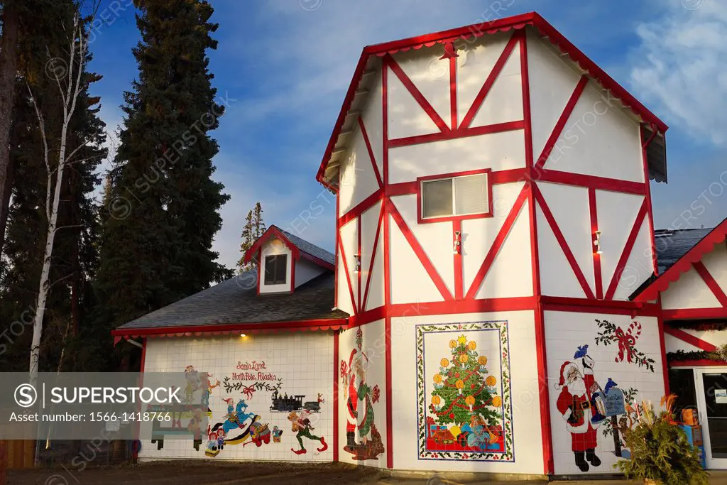 The Santa Claus House at SantaLand North Pole Alaska with Christmas scene tiles.