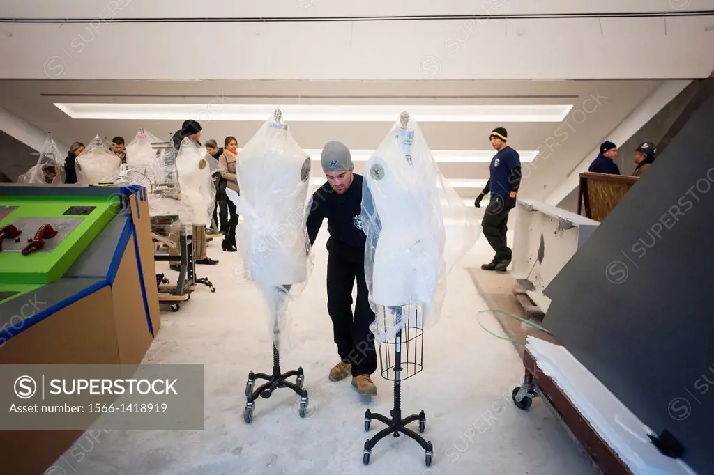 Movers from Globe Moving and Storage transfer mannequins slated for Parsons´ famed School of Fashion into the new University Center building of the Ne...