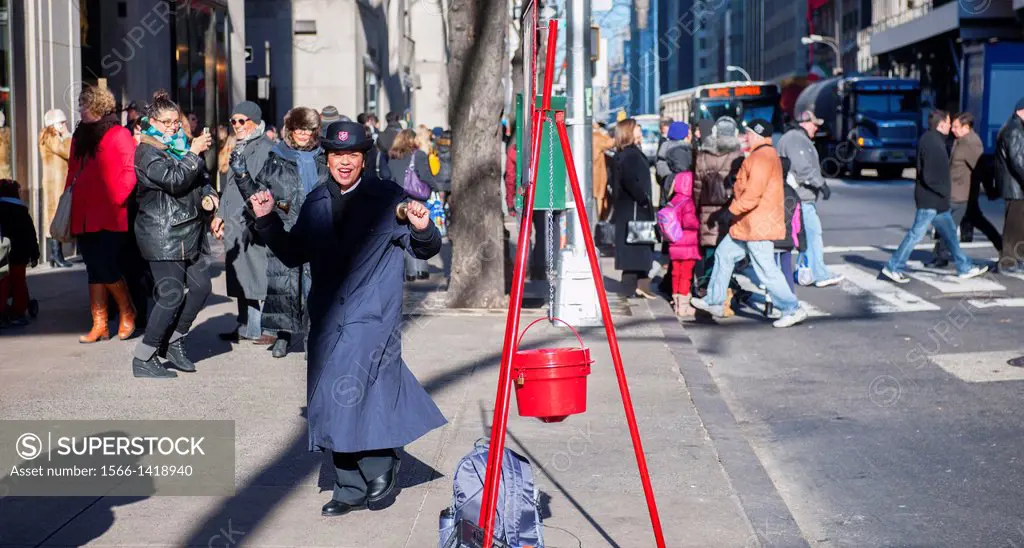 A Salvation Army bell ringer in front of Rockefeller Center in New York during the Christmas season. This year the Volunteers of America announced tha...