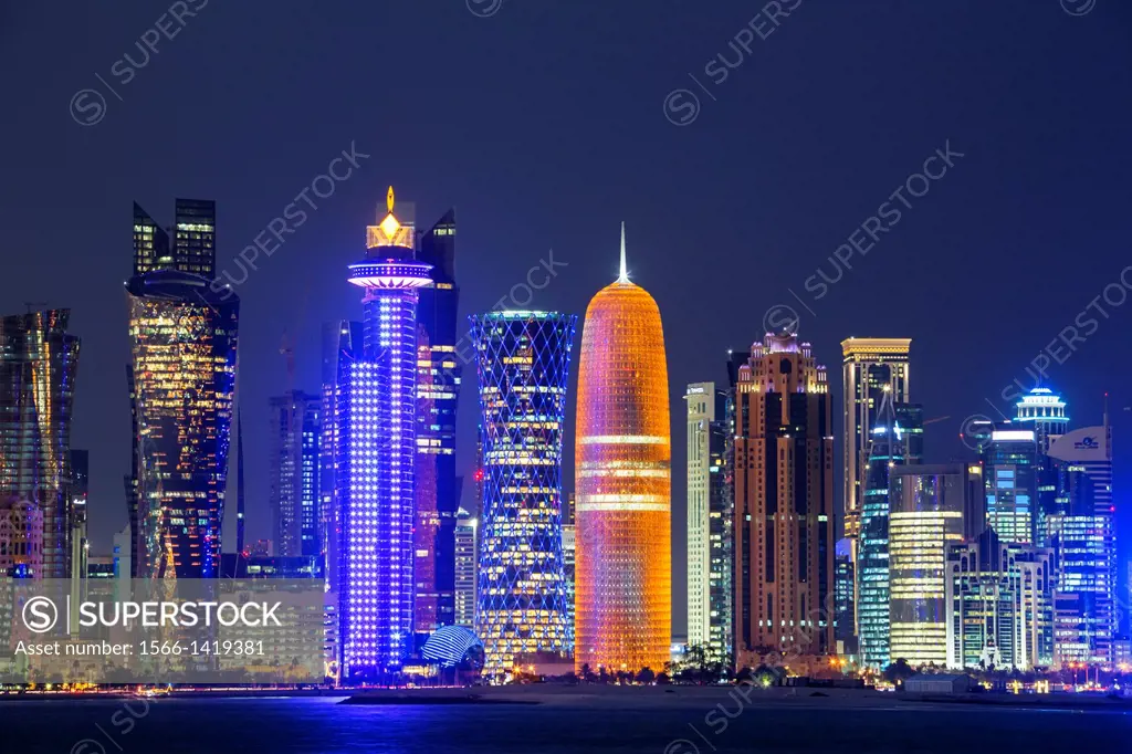 Qatar , Doha City, The Corniche , West Bay Skyline at sunset.