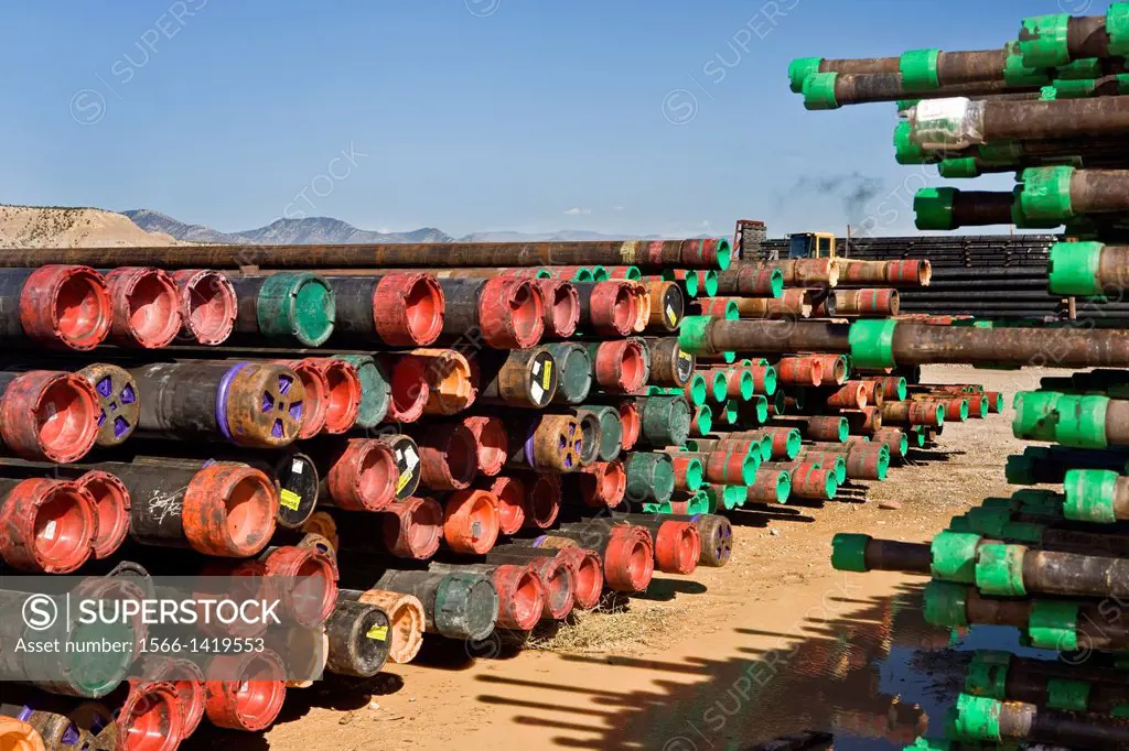 Stacked drill pipe in oil-gas area in Colorado.