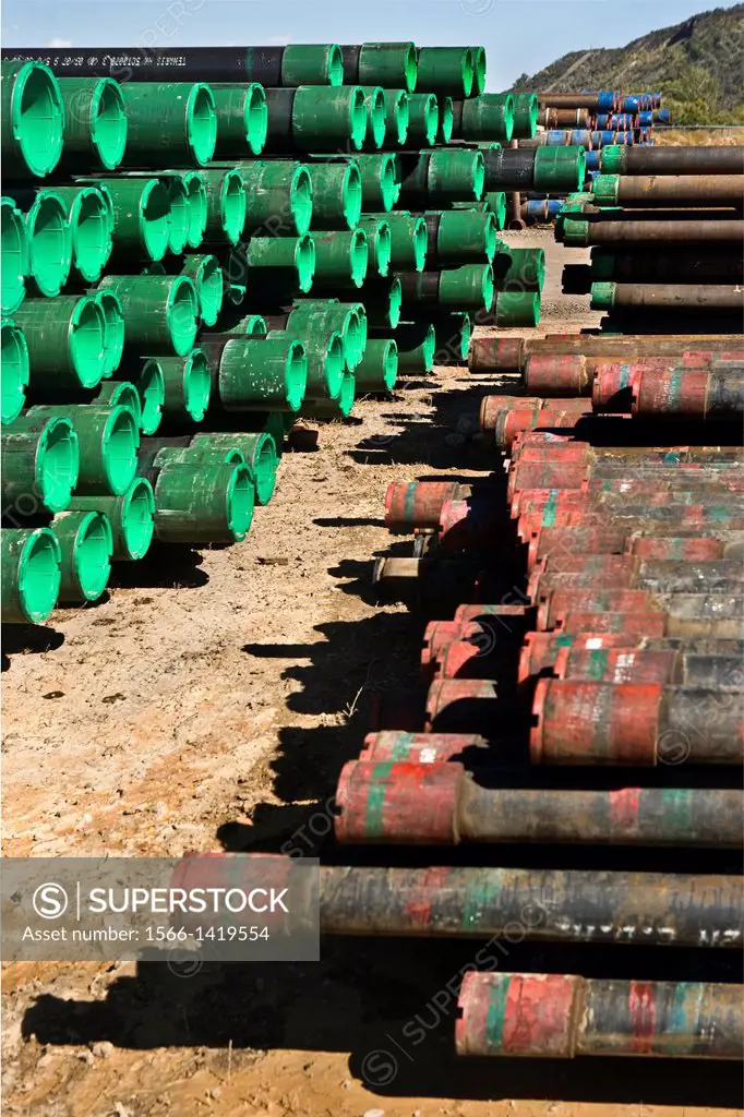 Stacked drill pipe in oil-gas area in Colorado.