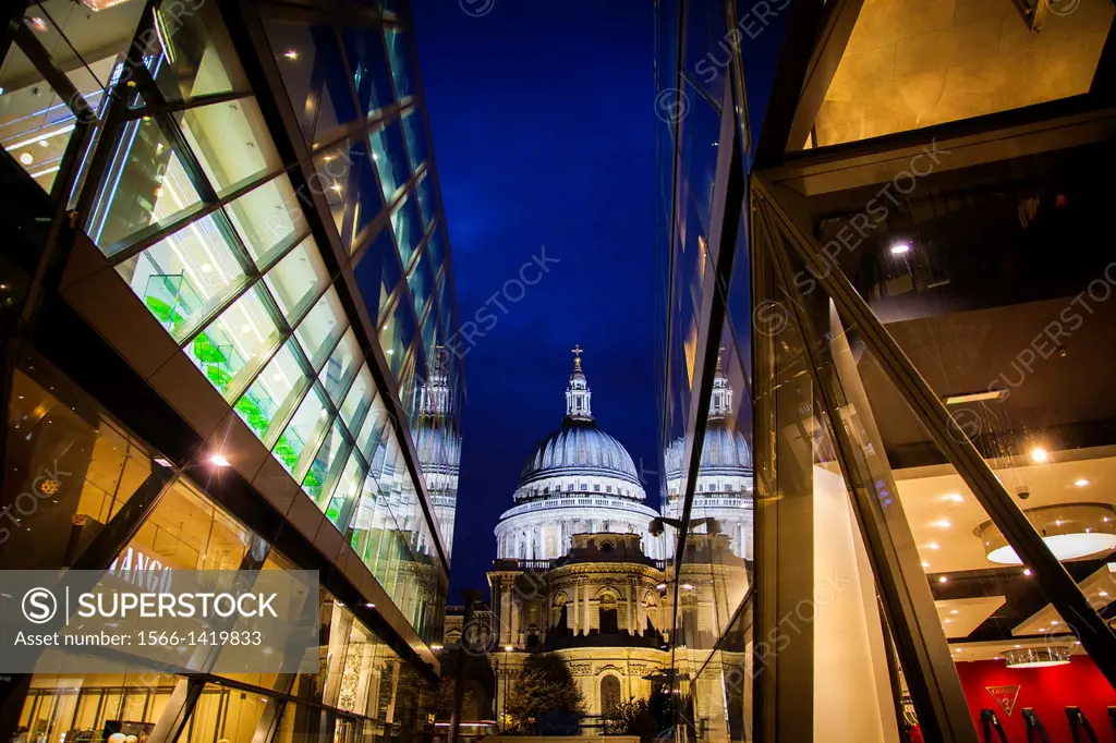 St Pauls Cathedral reflected in glass walls of One New Change in London.