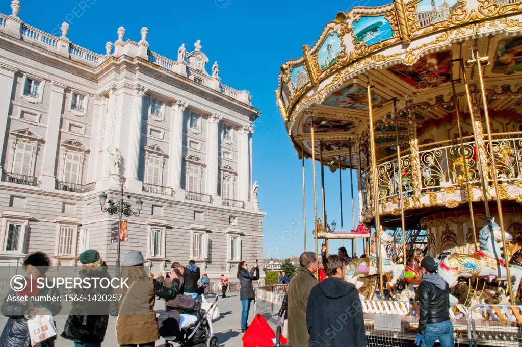 Carousel at Christmas time by the Royal Palace. Bailen street, Madrid, Spain.