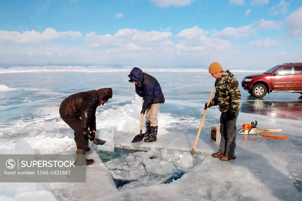 Preparations for ice-diving, in Lake Baikal, Olkhon island, Siberia, Russia, Eurasia.