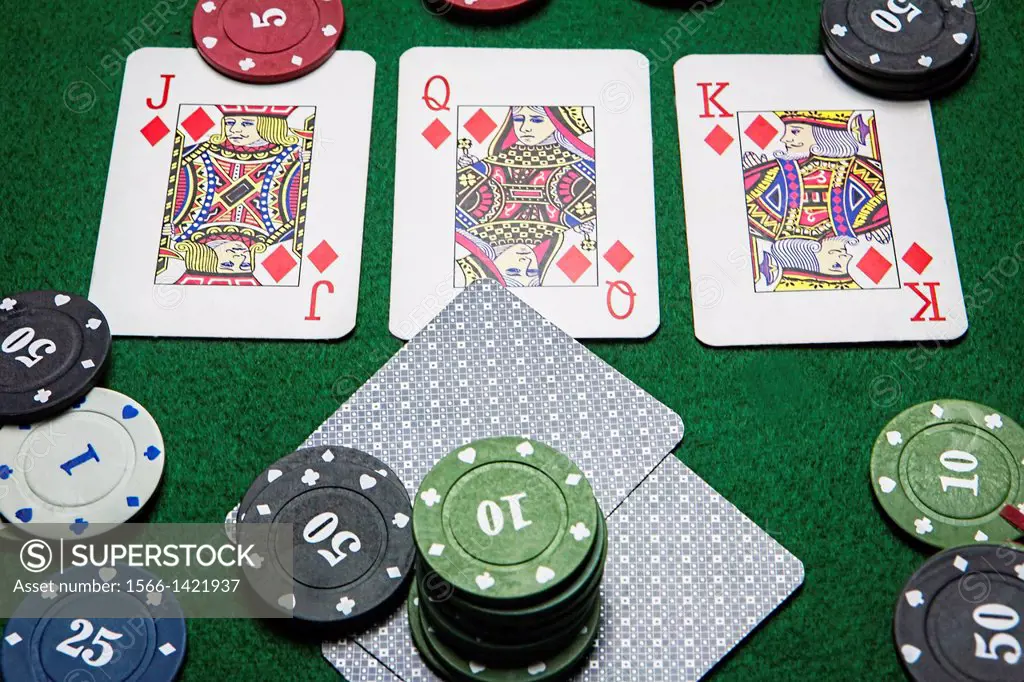cards poker deck English, Poker game interesting with a possible winning combination on green background.