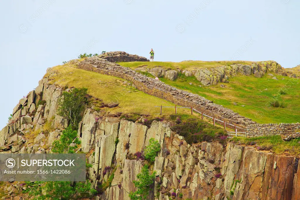 Tourist on Hadrians Wall National Trail, above Walltown Quarry Northumberland England United Kingdom Great Britain UK GB.