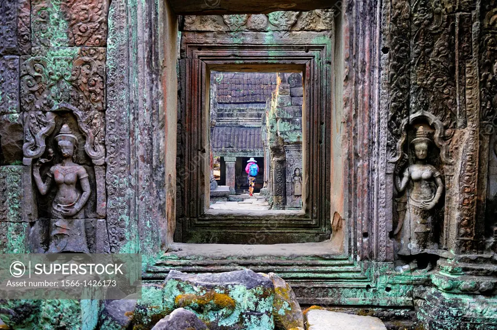 Woman visting Preah Khan temple. Cambodia, Siem Reap, Angkor.