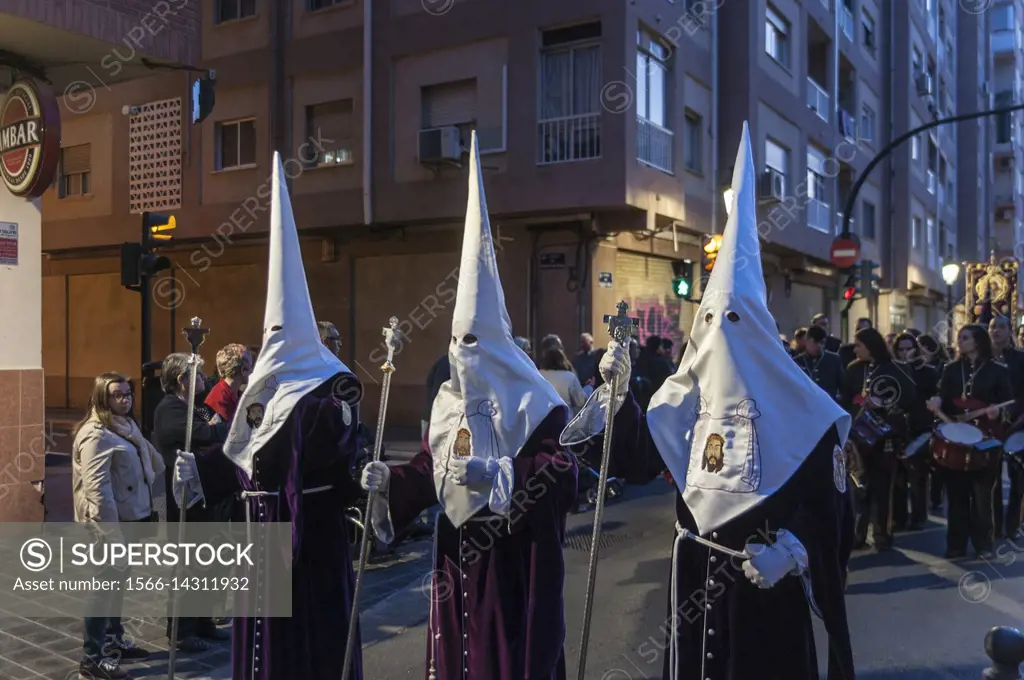 Nazarenos (penitents) in Holy Week procession, Valencia, Spain