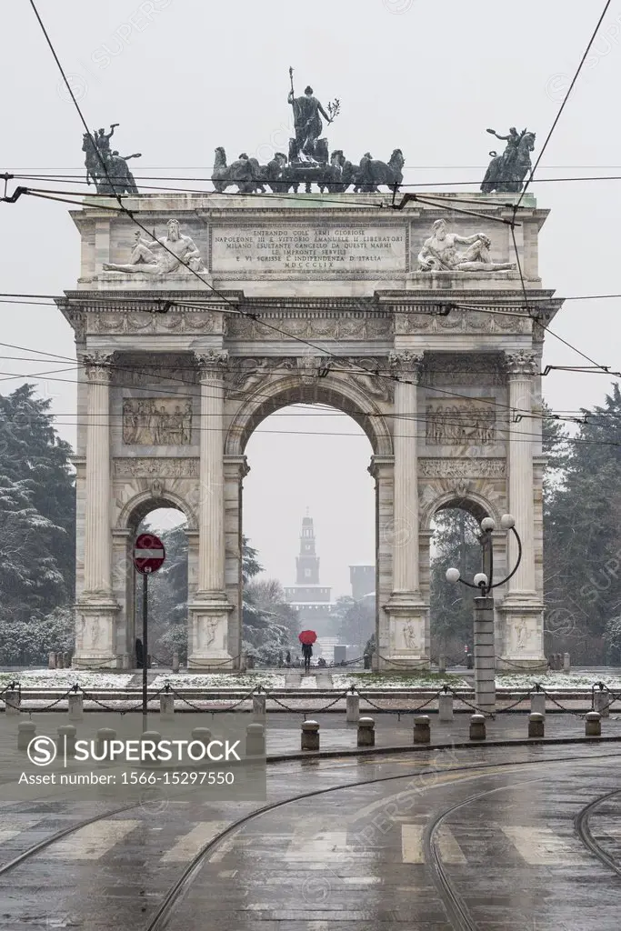 Arch of Peace and Sempione Park under a snowfall. Milan, Lombardy, Italy, Europe.