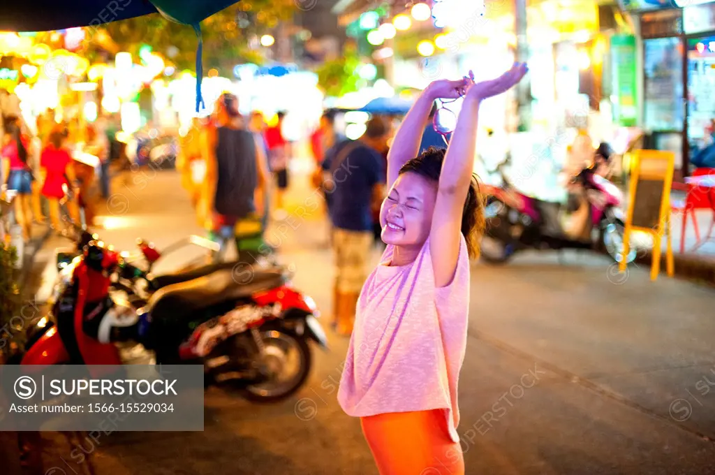 Japanese girl poses for pictures in Bangkok, Thailand.