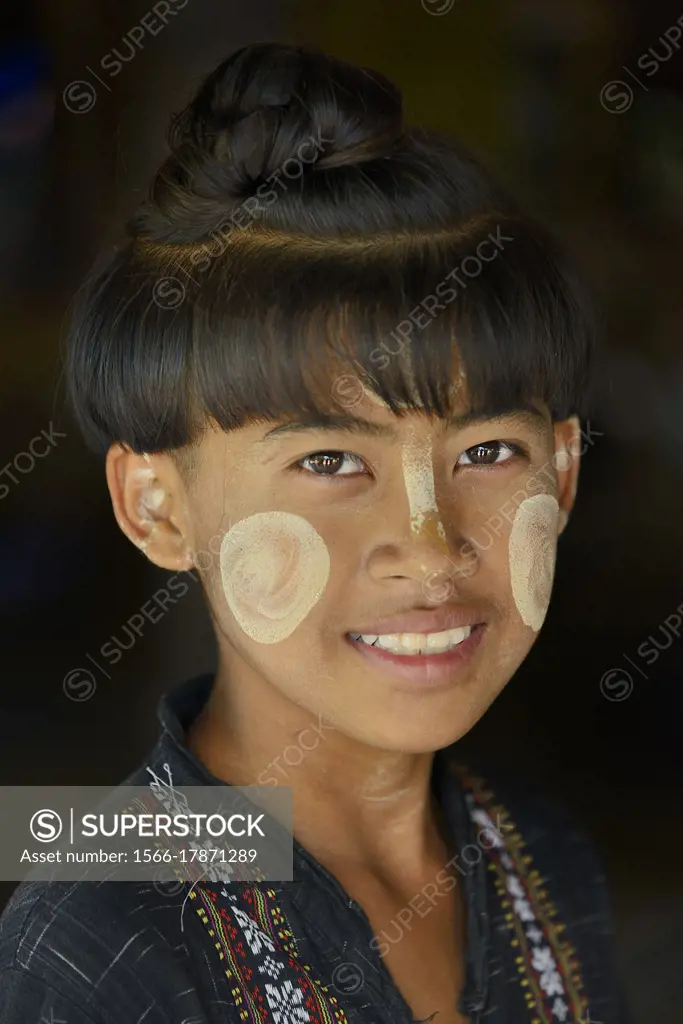 Myanmar, Bagan region, Set Setyo village, Kid with traditional hairstyle.
