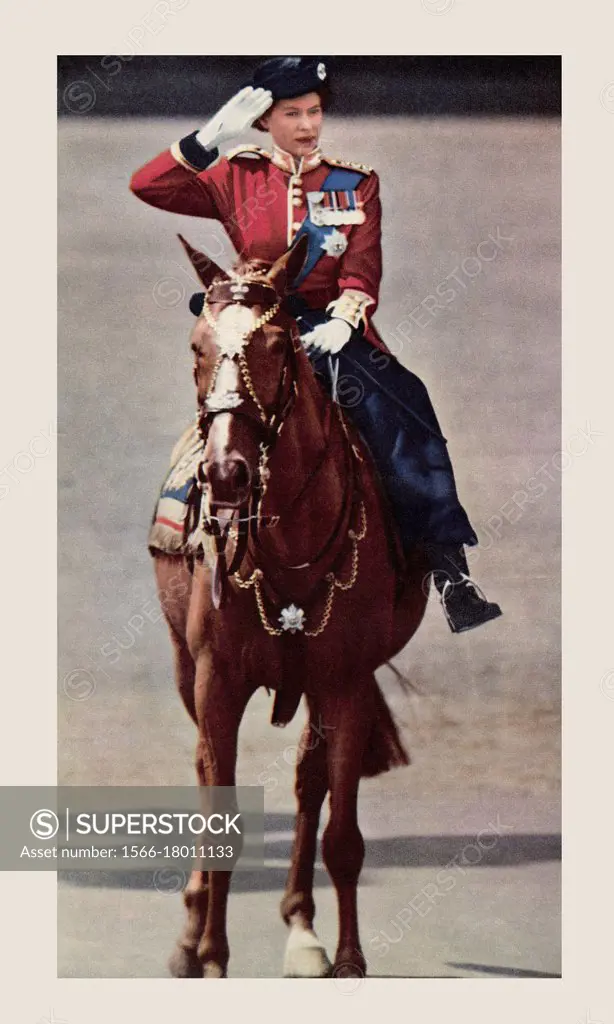 EDITORIAL ONLY Queen Elizabeth taking the salute during the Trooping of the Colour. Elizabeth II, born 1926, Queen of the United Kingdom. From The Que...