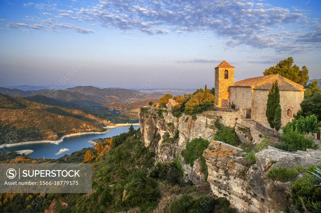Siurana medieval village with romanesque church of Santa Maria de Siurana and the Siurana Lake in Prades mountainas Priorat Tarragona Catalonia Spain.