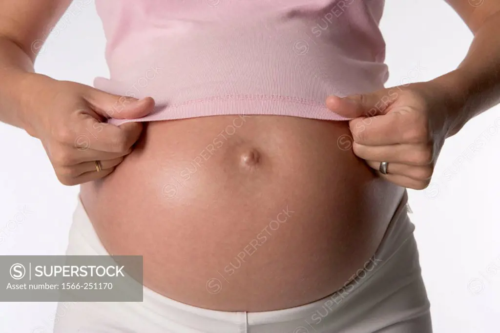 Pregnant belly with hands