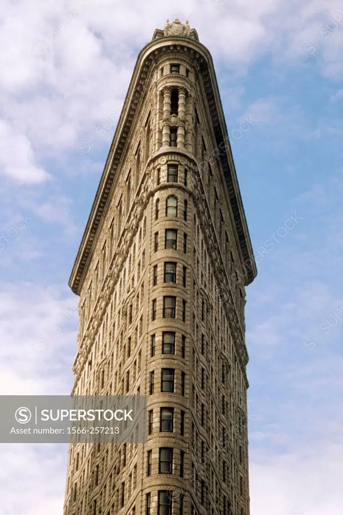The Flatiron (architect Daniel Burnham, 1902) building on 23rd Street and 5th Avenue in New York City looking straight up from 23rd, NYC. USA (Spring,...