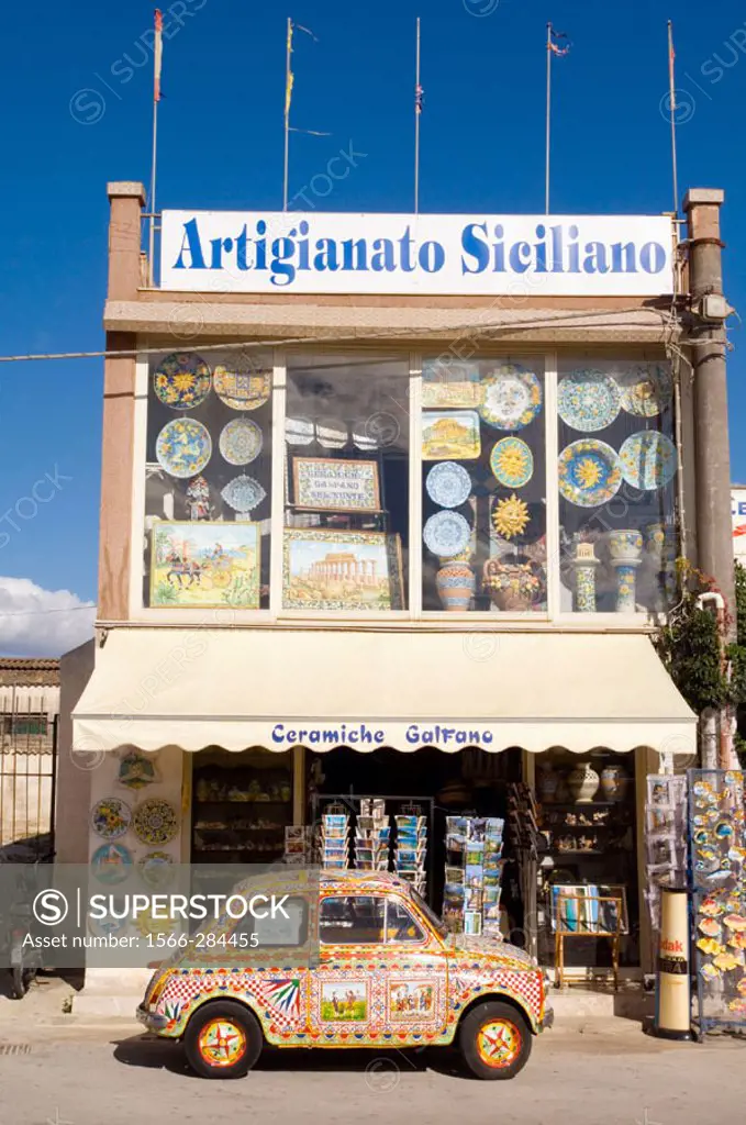 Selinunte ruins. Fiat 500 looking like an old Sicilian cart in front of a souvenir shop. Castelvetrano. Sicily. Italy.