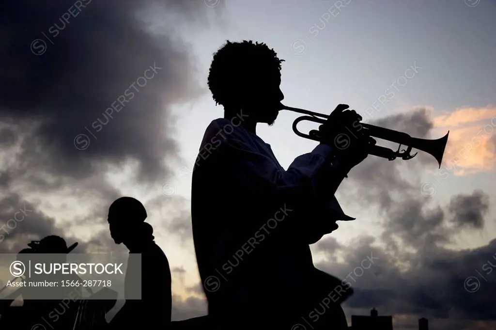 Trumpet player in El Malecón in the evening. Havana. Cuba