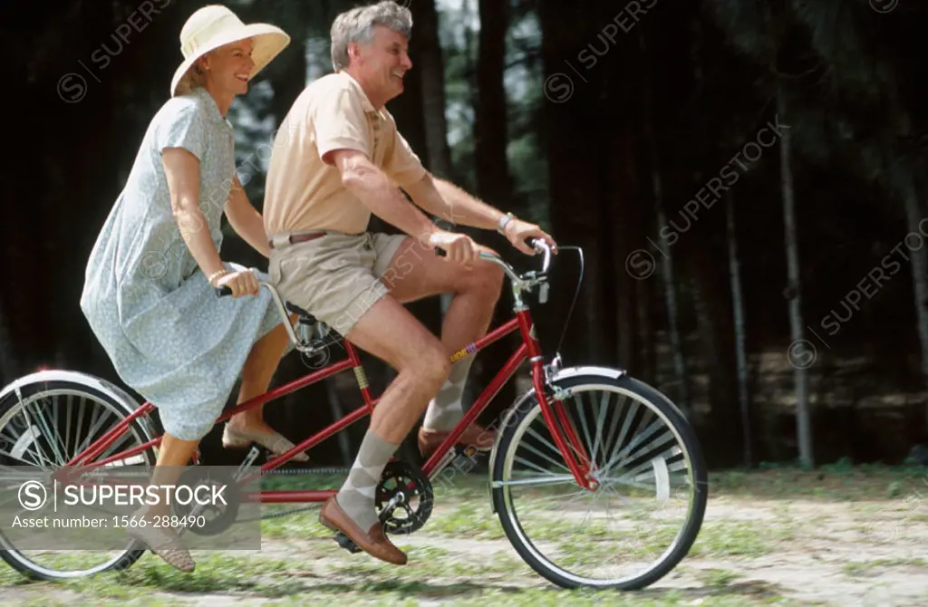 couple on a tandem bike