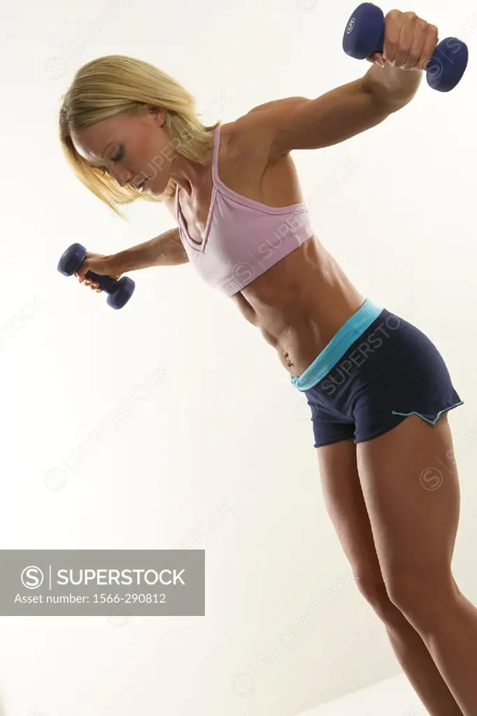 Blonde caucasian american female fitness model, action