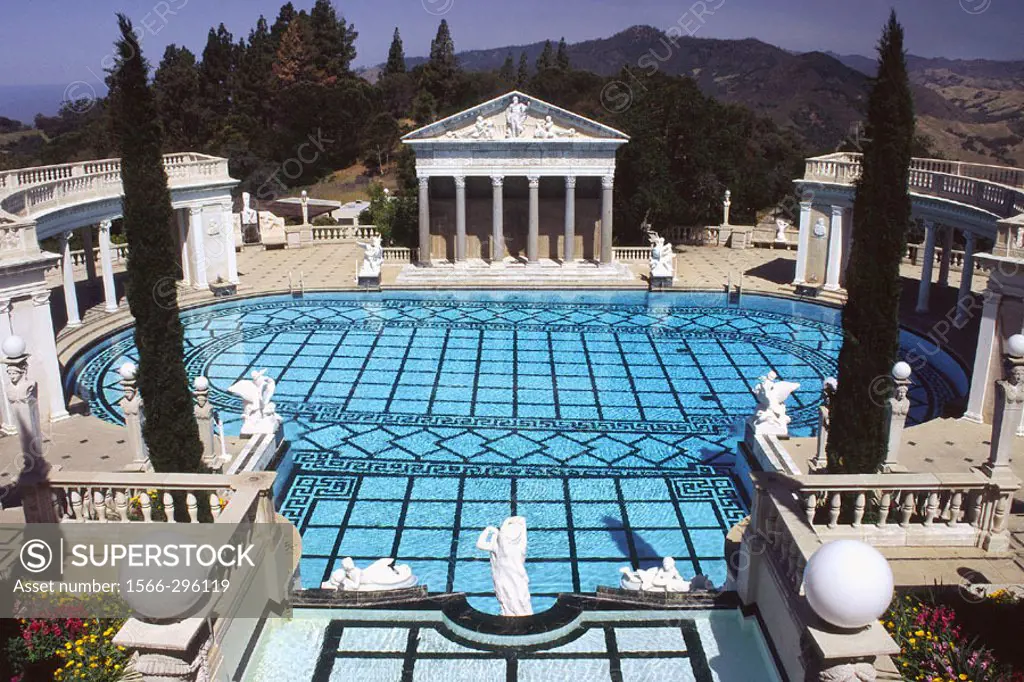 The Neptune Pool flanked by colonnades and the facade of a Greek temple in the grounds of Hearst Castle, San Simeon, California, United States of Amer...