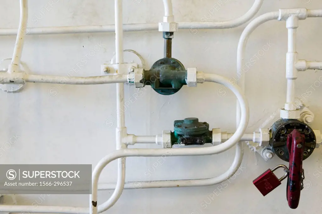 Pipes and valves on a naval ship. San Francisco. California. United States