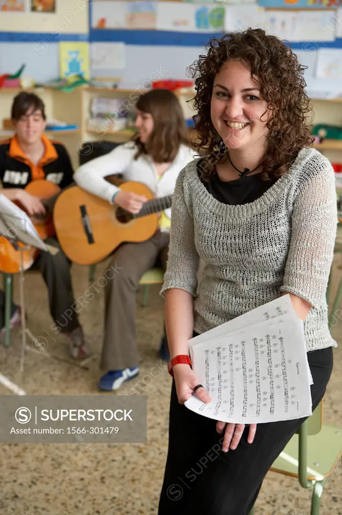 Music teacher, guitar instruction