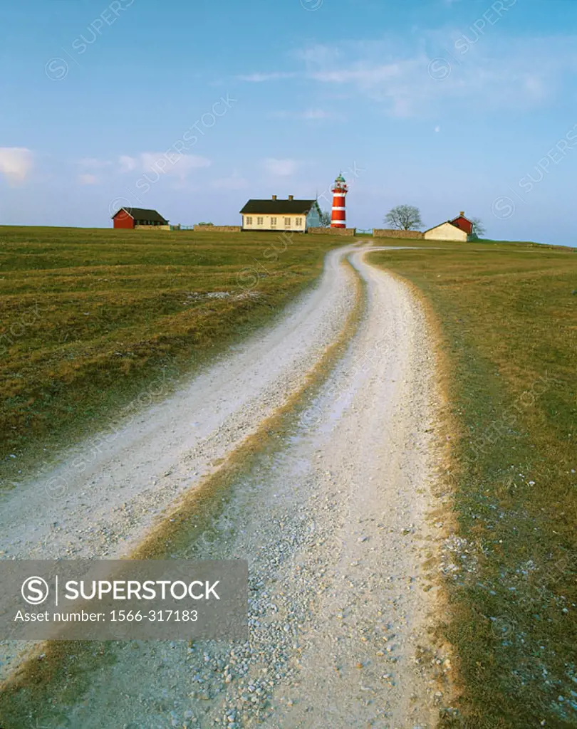 Lighthouse and gravel road, Gotland, Sweden.