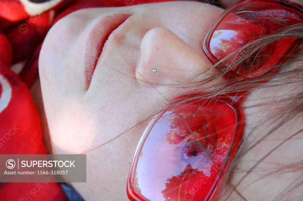 Girl in red sunglasses
