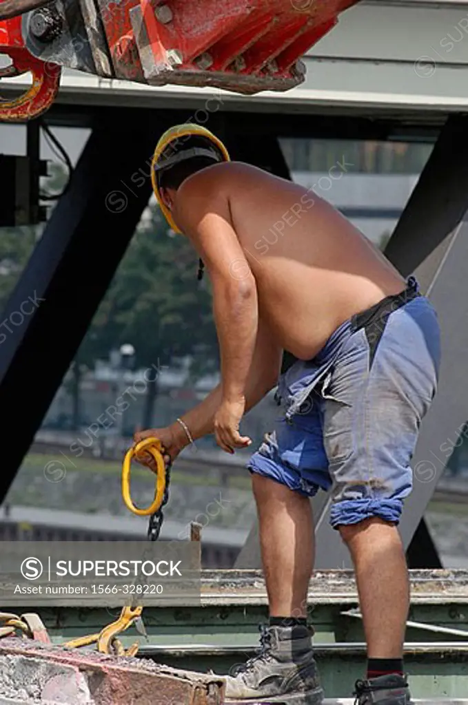 Construction worker at building site in Switzerland.